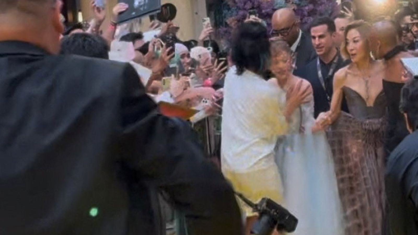 Ariana Grande rushed by red carpet intruder at premiere of Wicked: For Good | Ents & Arts News