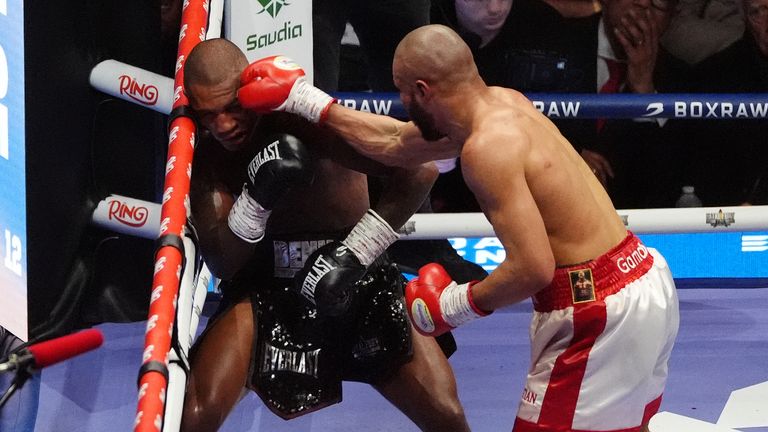 Eubank Jr (right) lands a punch on Benn. Pic: PA