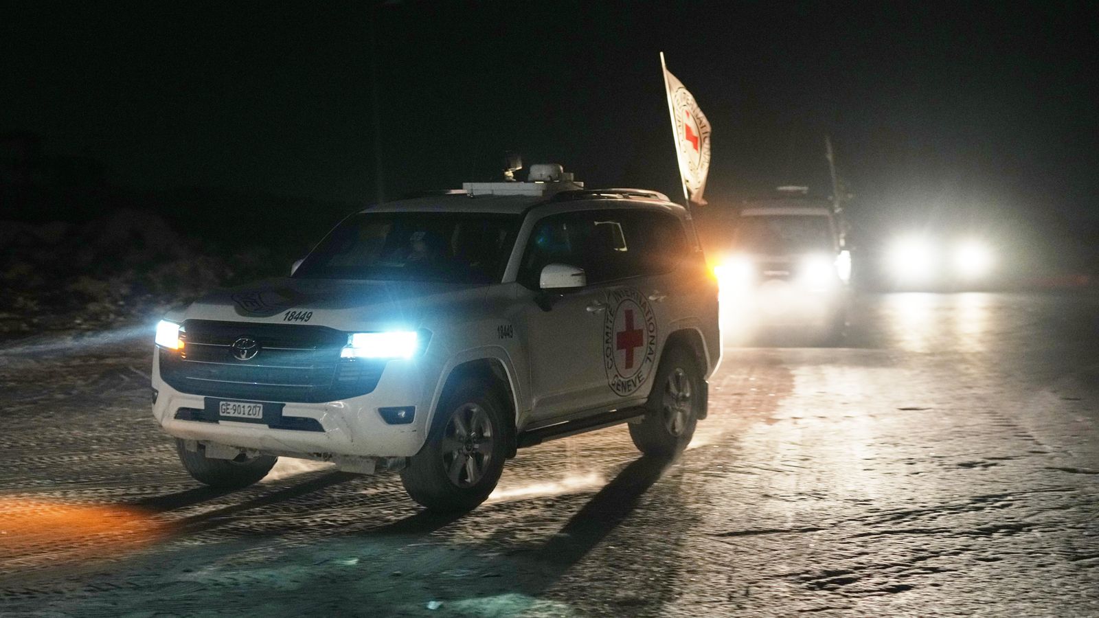 A Red Cross convoy carries the remains of a hostage handed over to Israel. Pic: AP
