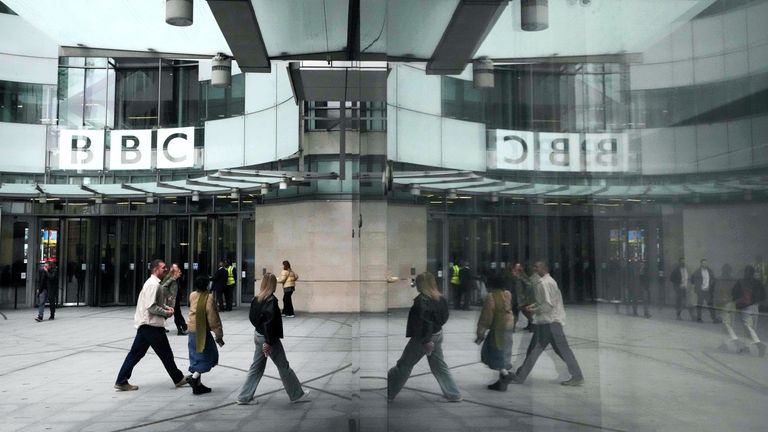 Pedestrians outside BBC Broadcasting House. Pic: AP