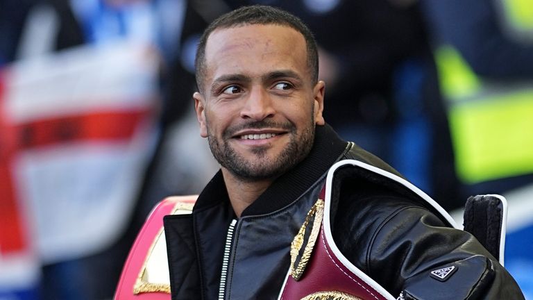 Local boxer Harlem Eubank shows off the IBF intercontinental welterweight title he won against Tyrone McKenna at the Brighton Centre on Friday before the English Premier League soccer match between Brighton and Hove Albion and Fulham , at the Amex Stadium in Brighton , Saturday,Mar. 8, 2025. (AP Photo/Dave Shopland