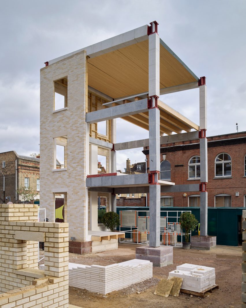 Photo of the back of the Stone Demonstrator, showing a building frame made of pre-tensioned stone columns and beams