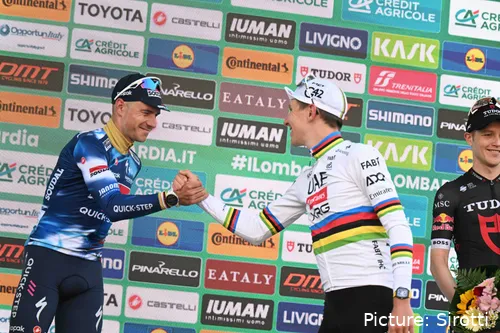 Remco Evenepoel congratulates Tadej Pogacar on his 5th successive Il Lombardia title