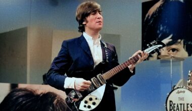 John Lennon of The Beatles during rehearsal for the third appearance on The Ed Sullivan Show. Image dated August 14, 1965.