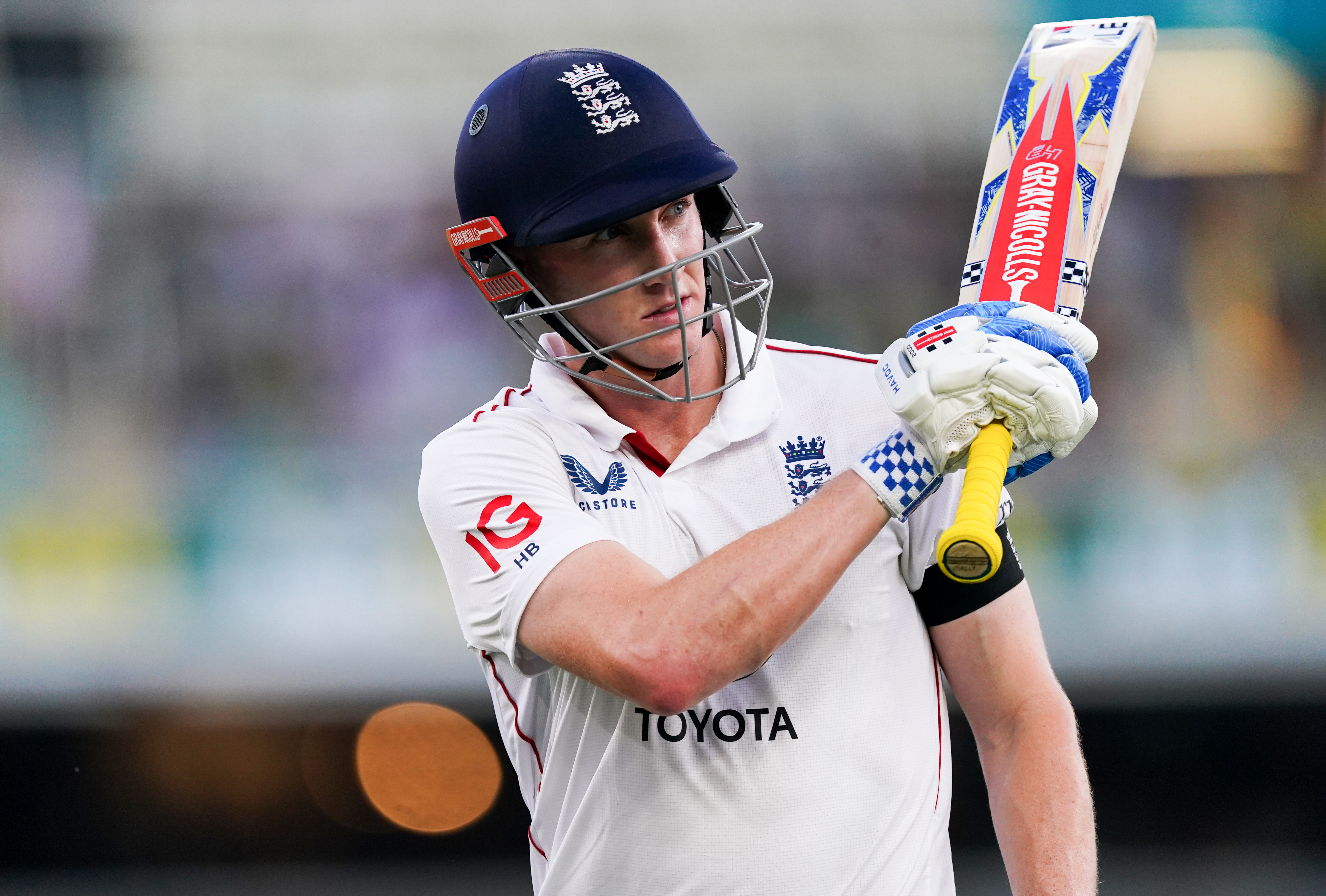 England's Harry Brook walks off dejected after being bowled by Australia's Mitchell Starc.