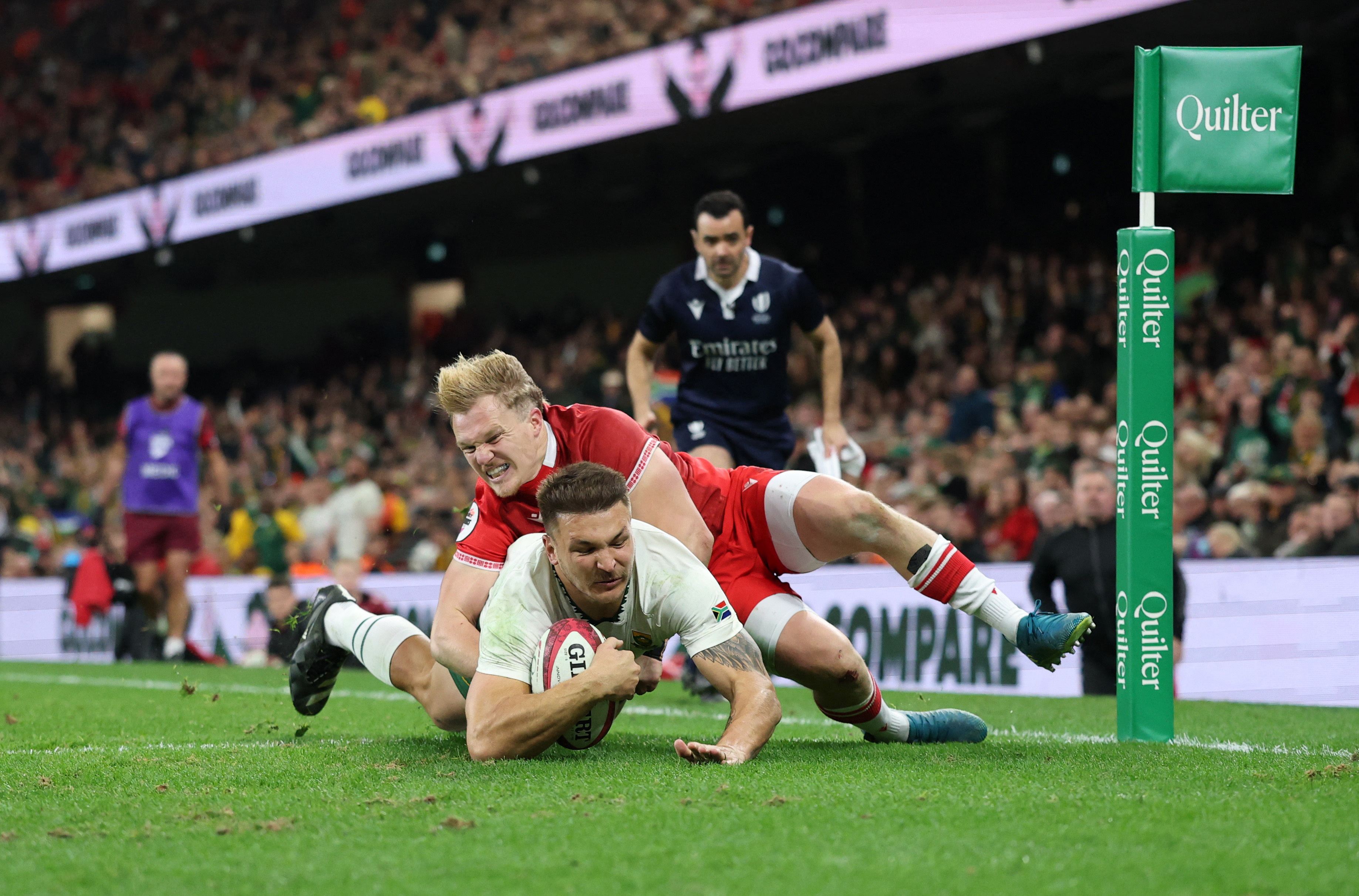 South Africa's Andre Esterhuizen scoring a try during a rugby match.