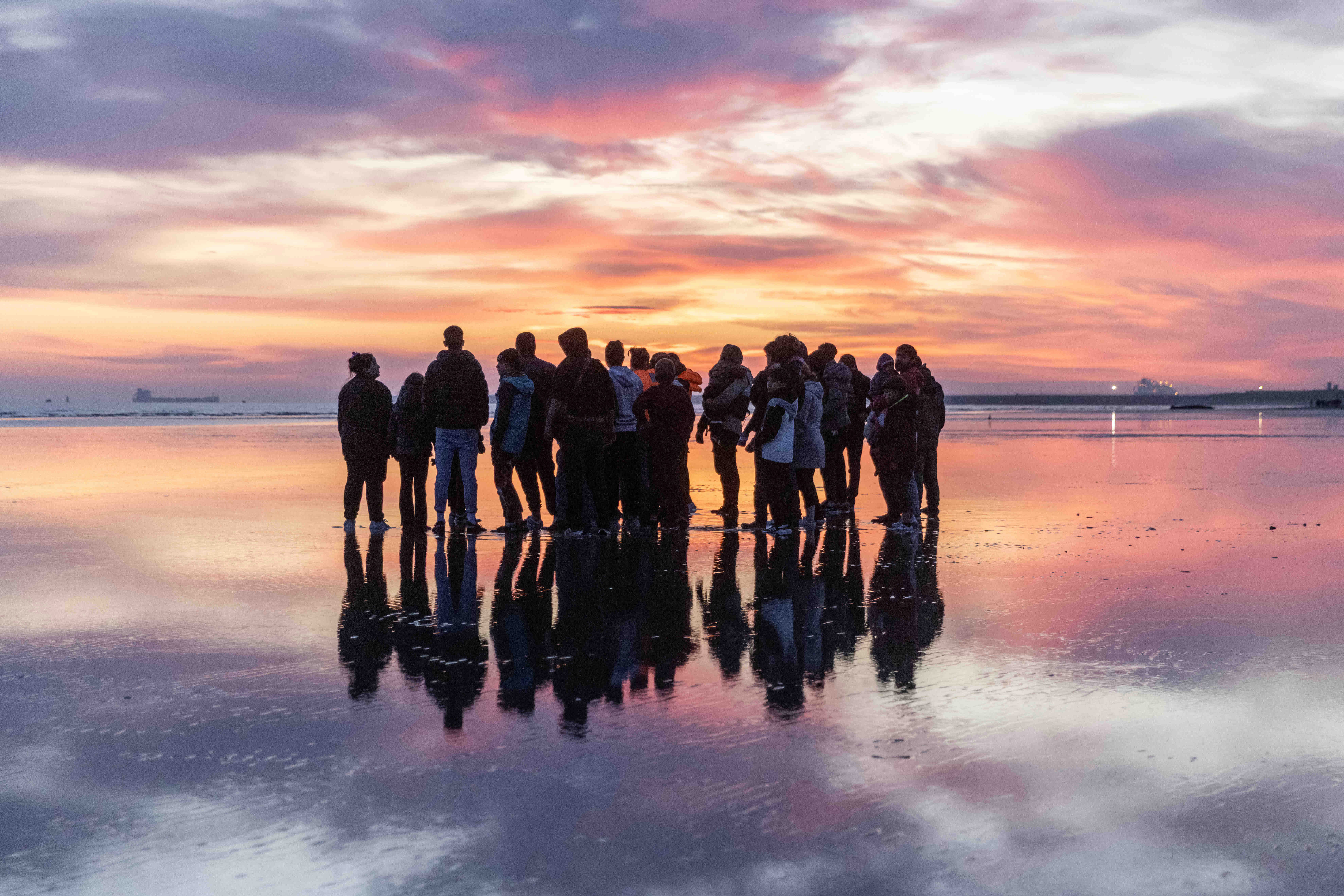 Migrants preparing to cross the English Channel from Gravelines beach near Dunkirk in northern France.