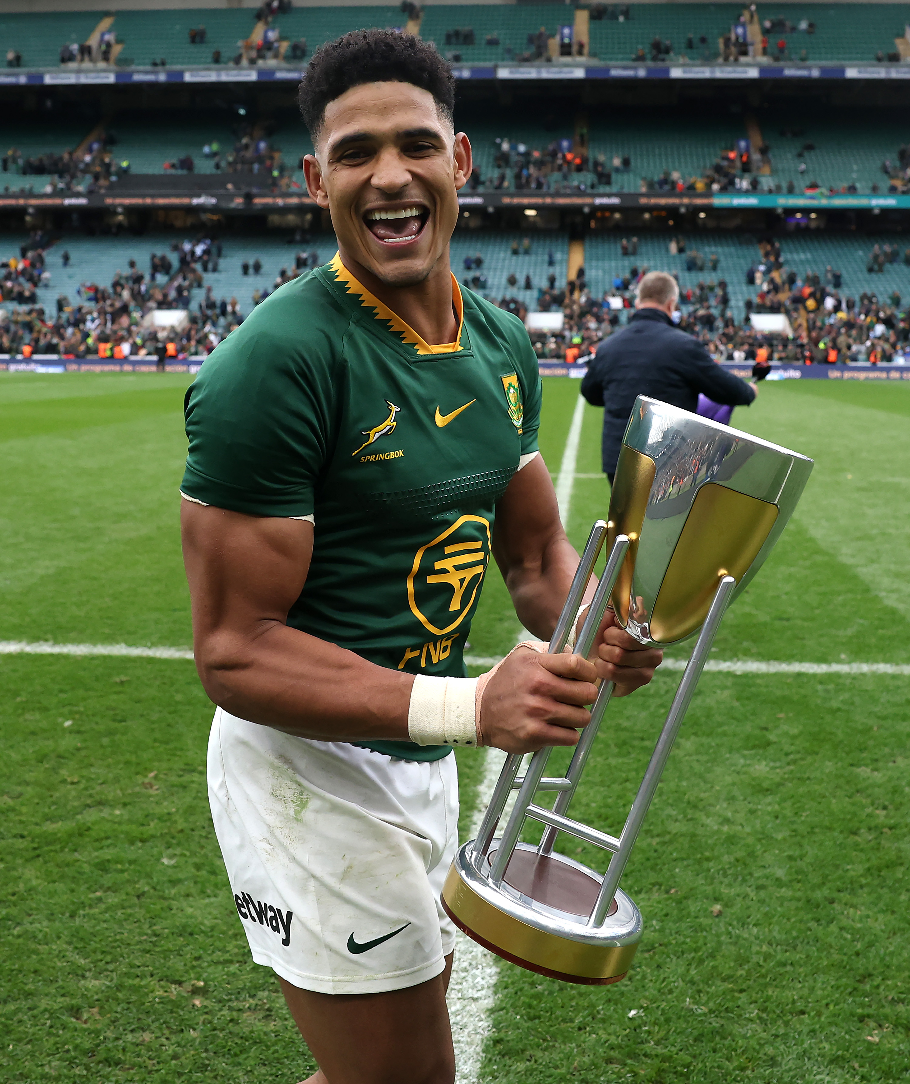 Sacha Feinberg-Mngomezulu of the South Africa Springboks celebrates with the Rugby Championship trophy.