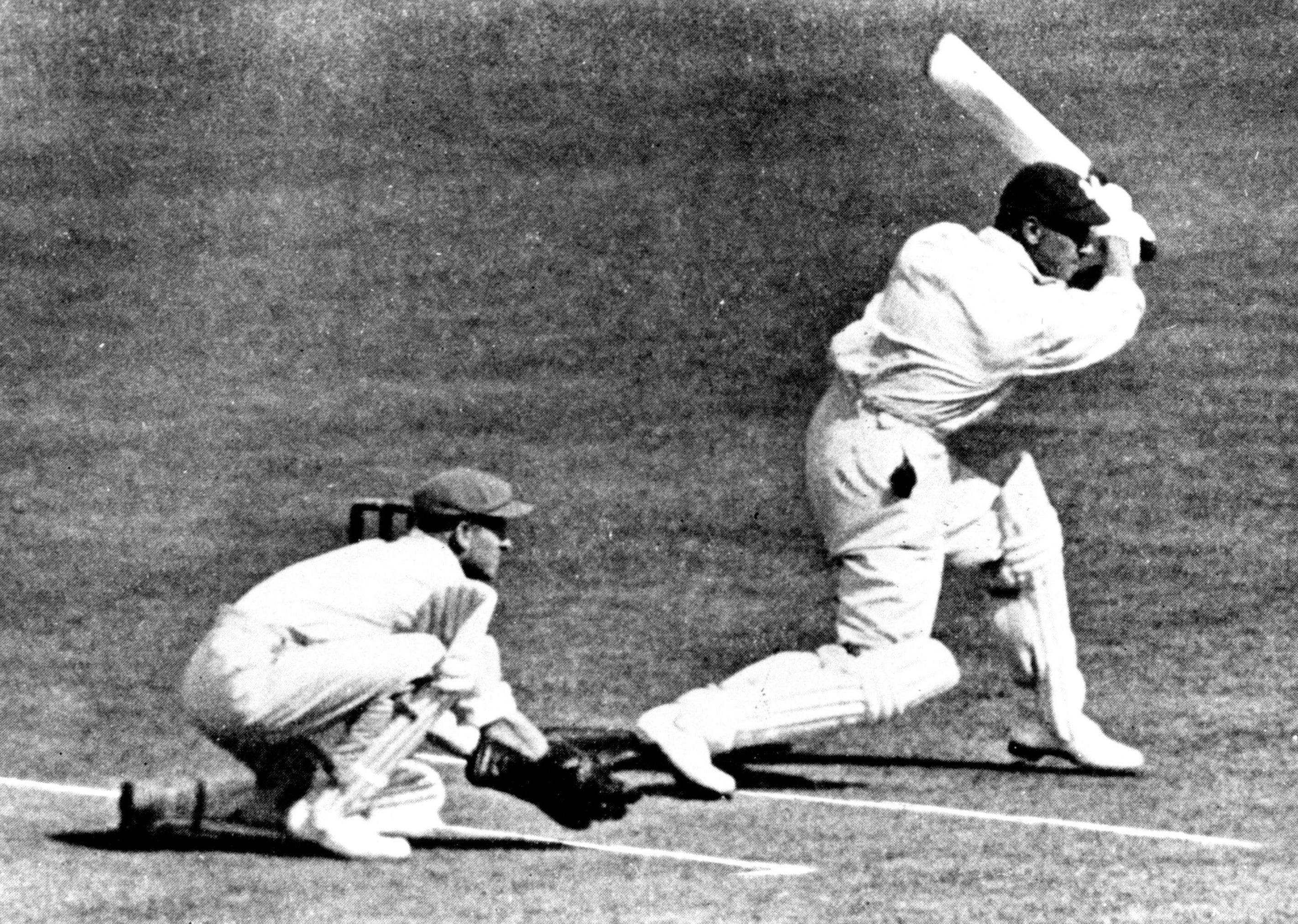 W.A. Bert Oldfield playing cricket for Britain against Australia.