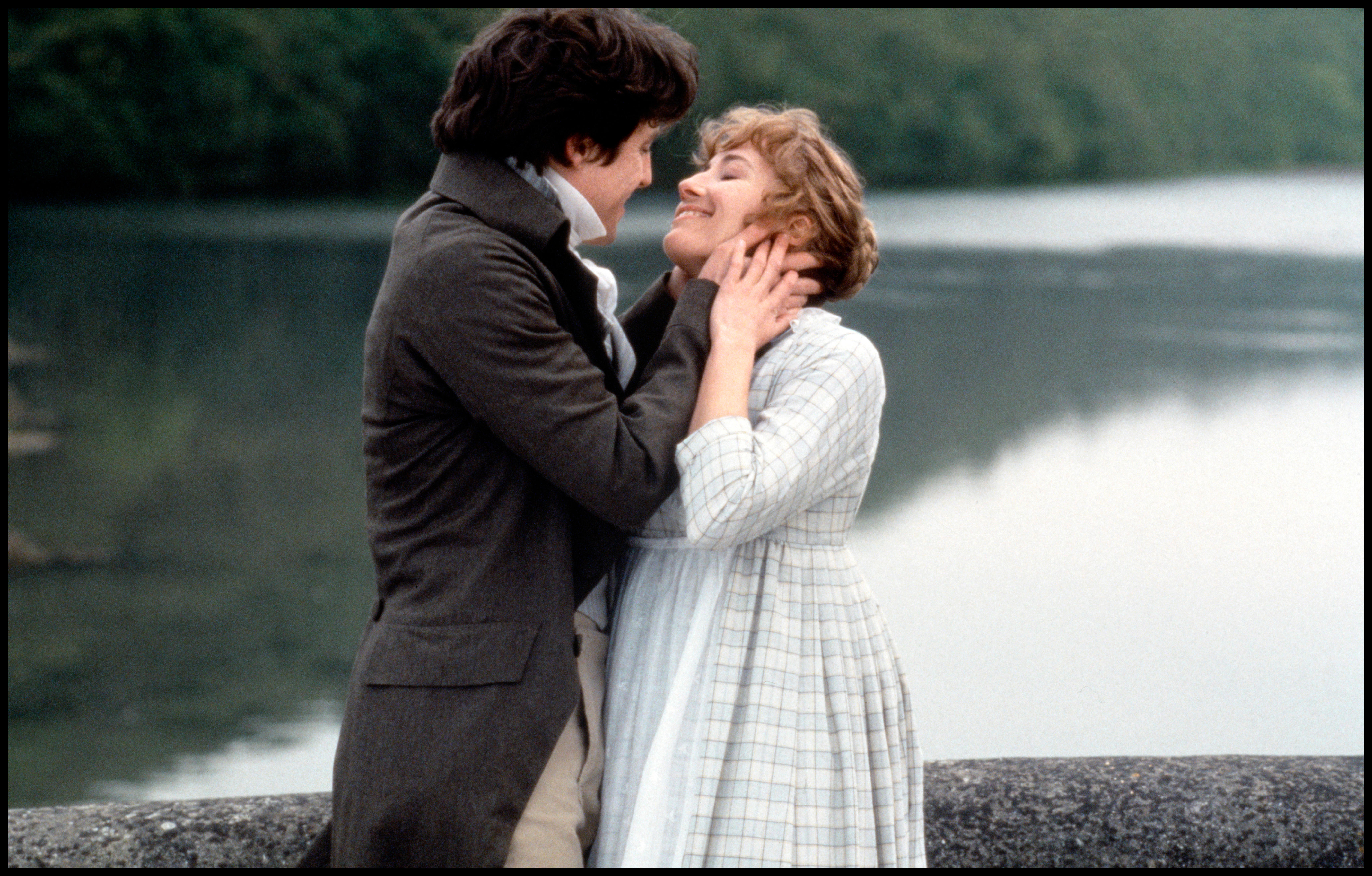 Hugh Grant and Emma Thompson in a passionate embrace.