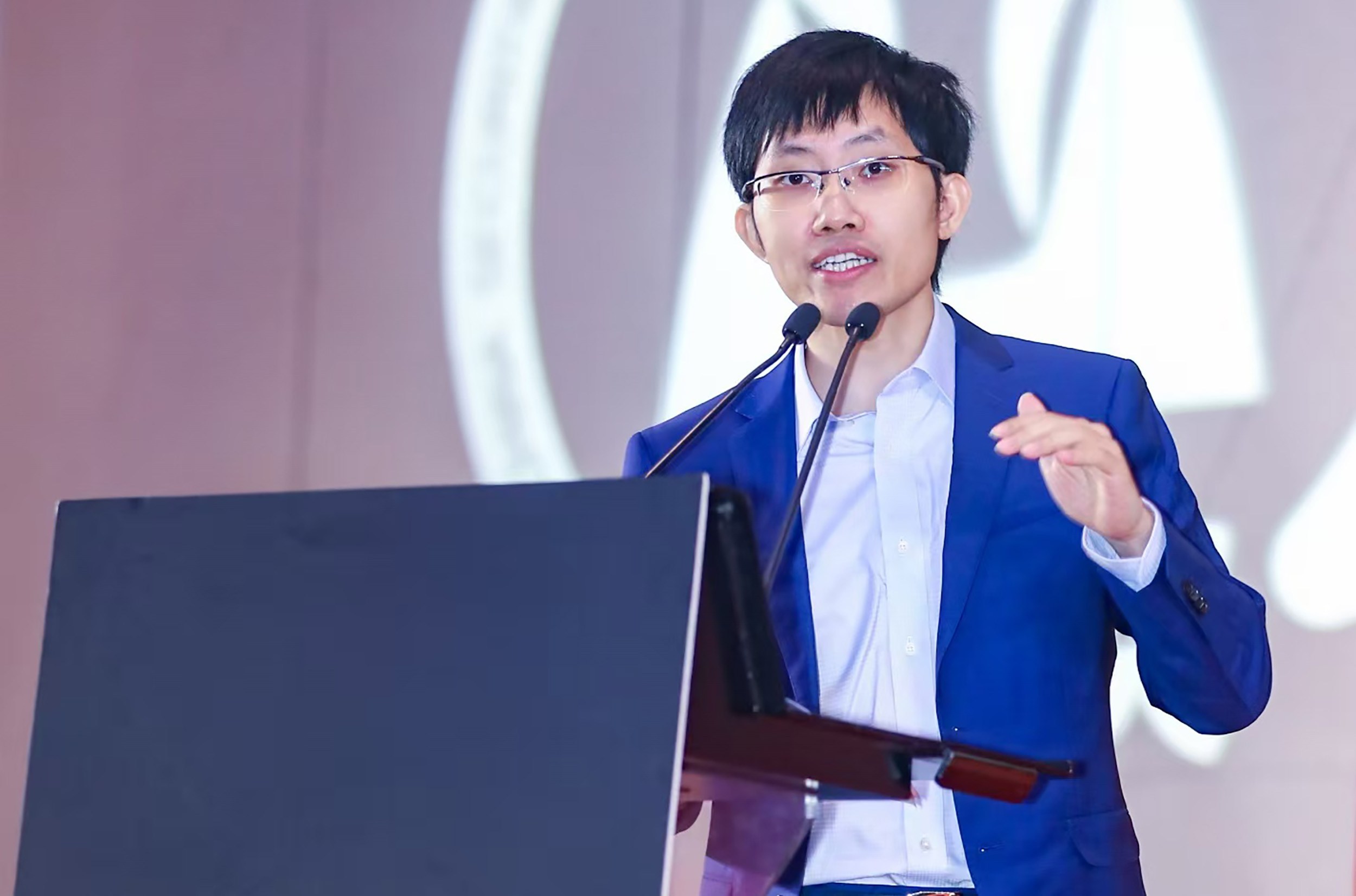 Liang Wenfeng, founder of DeepSeek, giving a keynote speech.