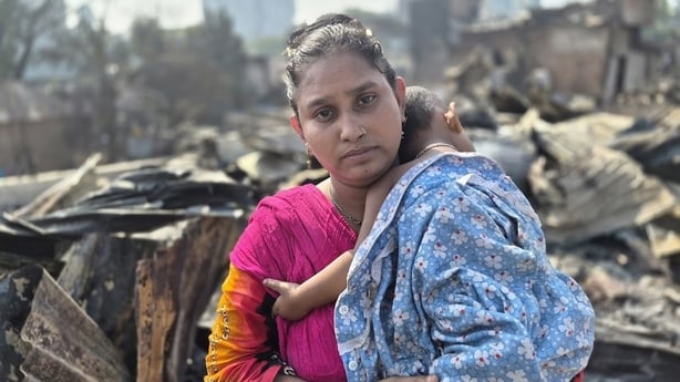 Minu Begum and her baby