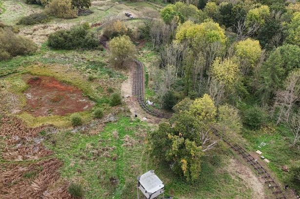 Aerial view of raised boardwalks under construction at Burpham Court Farm nature reserve
