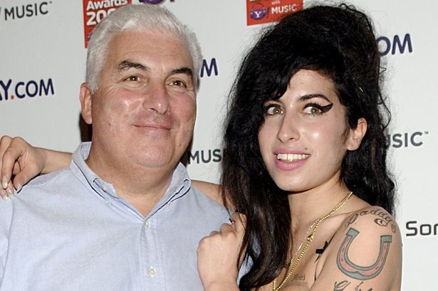 Amy Winehouse's dad, Mitch, is facing her closest friends at the High Court