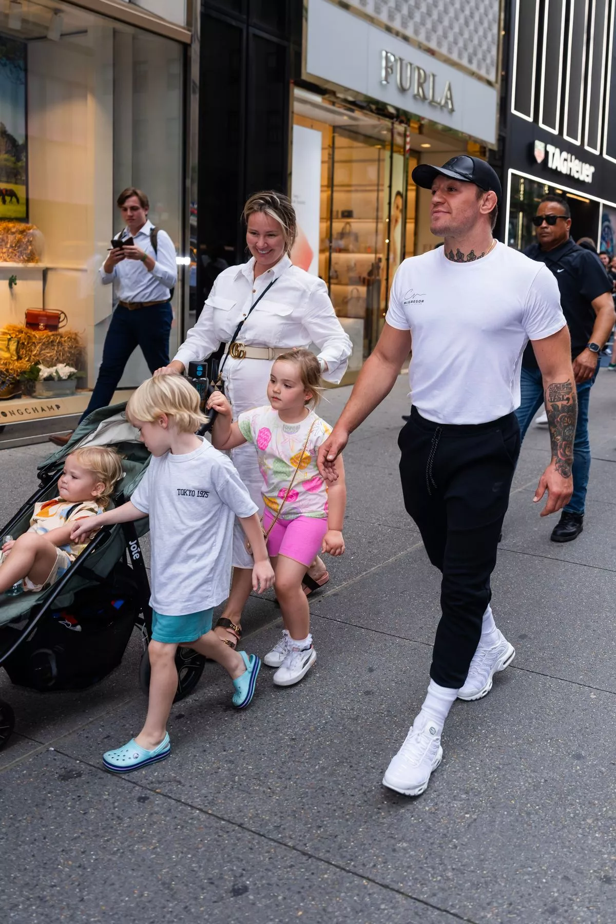 Dee Devlin (L) and Conor McGregor are seen in Midtown on July 12, 2023 in New York City.