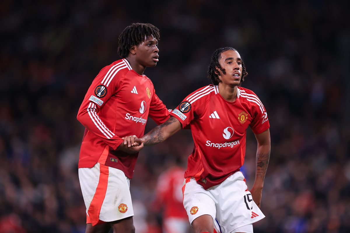 Patrick Dorgu of Manchester United (L) and Leny Yoro of Manchester United look on during the UEFA Europa League 2024/25 Semi Final Second Leg match between Manchester United and Athletic Club at Old Trafford on May 8, 2025 in Manchester, United Kingdom.