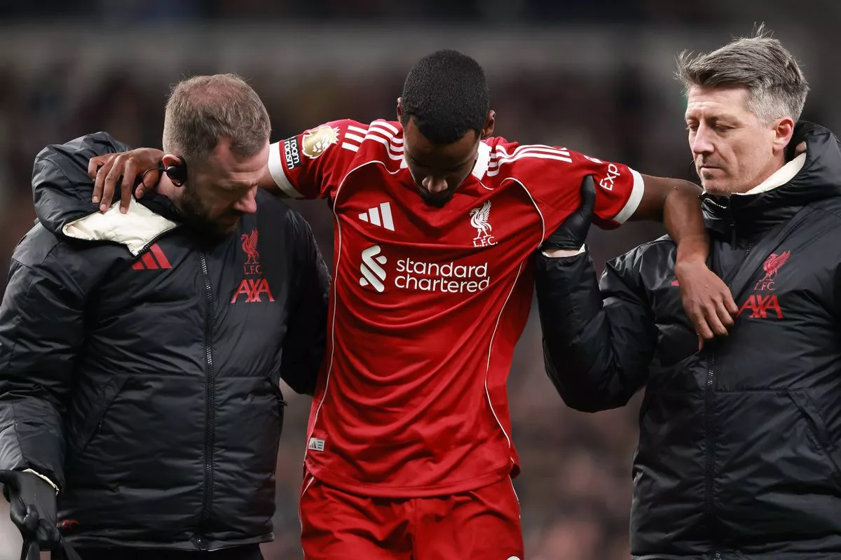  Alexander Isak of Liverpool leaves the game injured