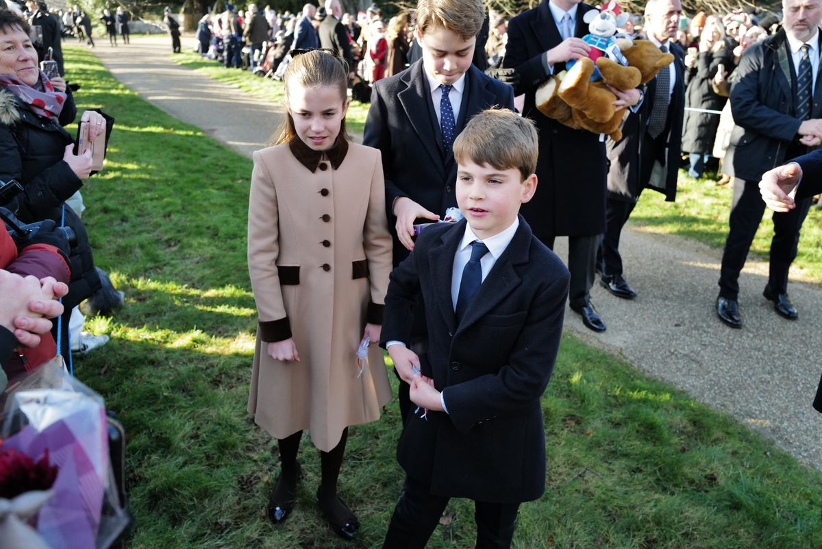 Charlotte with George and Louis, who were given cuddly toys 