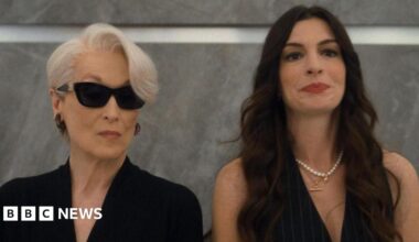 Meryl Streep and Anne Hathaway standing in a lift together in The Devil Wears Prada 2