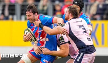 Paul Gabrillagues of Stade Francais is tackled by Cardiff prop Sam Wainwright