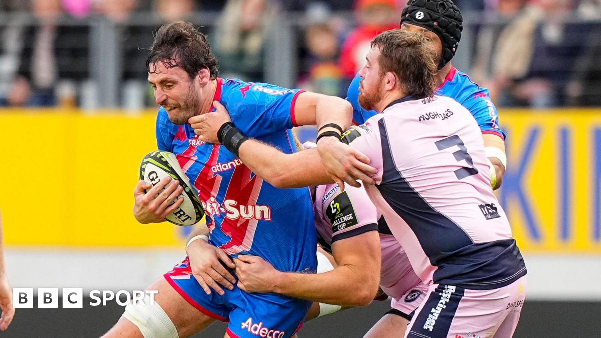 Paul Gabrillagues of Stade Francais is tackled by Cardiff prop Sam Wainwright