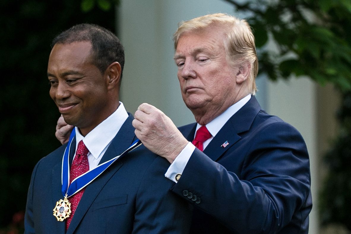 President Donald Trump presents Woods with the Presidential Medal of Freedom, the nation's highest civilian honor, in May 2019. It was just a month after Woods won his fifth Masters and 15th major. <a href=