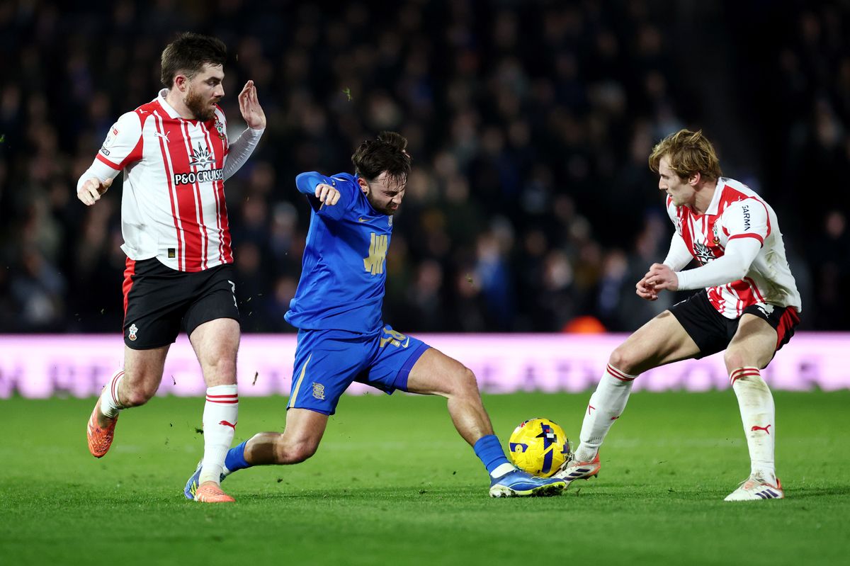 Patrick Roberts of Birmingham City battles for possession with Flynn Downes and Ryan Manning of Southampton