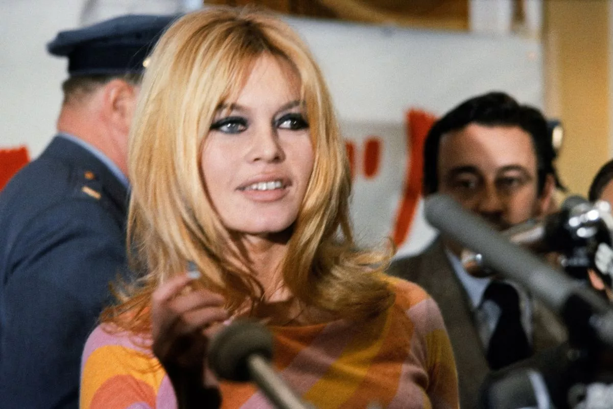 Brigitte Bardot wearing a colourful top in 1965