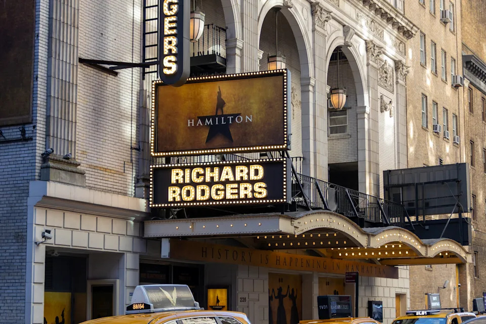 Richard Rodgers Theatre with "Hamilton" marquee; taxis parked outside