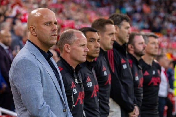 LIVERPOOL, ENGLAND - Friday, August 15, 2025: Liverpool's head coach Arne Slot and his staff stand in silence as they pay tribute to Diogo Jota, who died in a car accident in July, during the FA Premier League match between Liverpool FC and AFC Bournemouth at Anfield. Liverpool won 4-2. (Photo by David Rawcliffe/Propaganda)