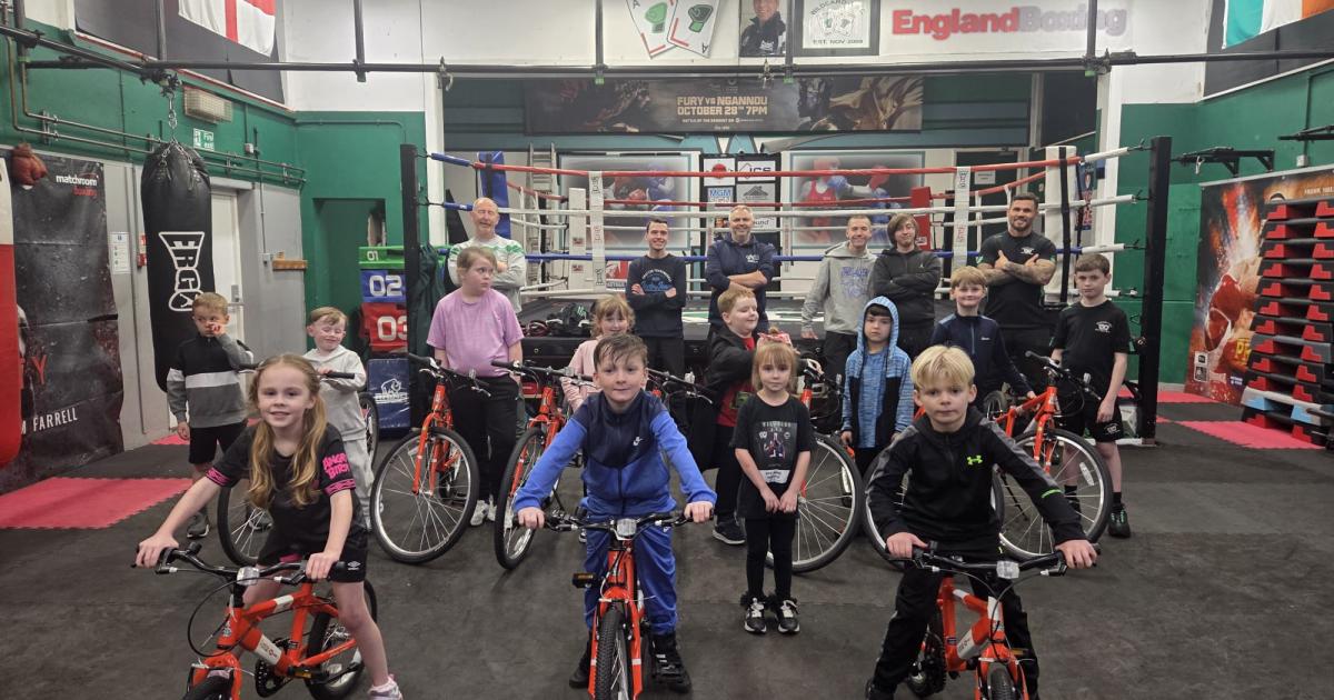 Martin Murray thanks Active Wellbeing Society for bikes donation