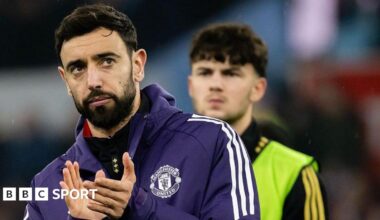 Bruno Fernandes applauds Manchester United's fans after the 2-1 loss at Aston Villa