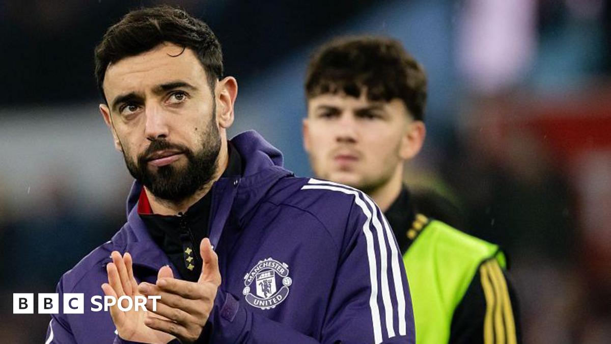 Bruno Fernandes applauds Manchester United's fans after the 2-1 loss at Aston Villa