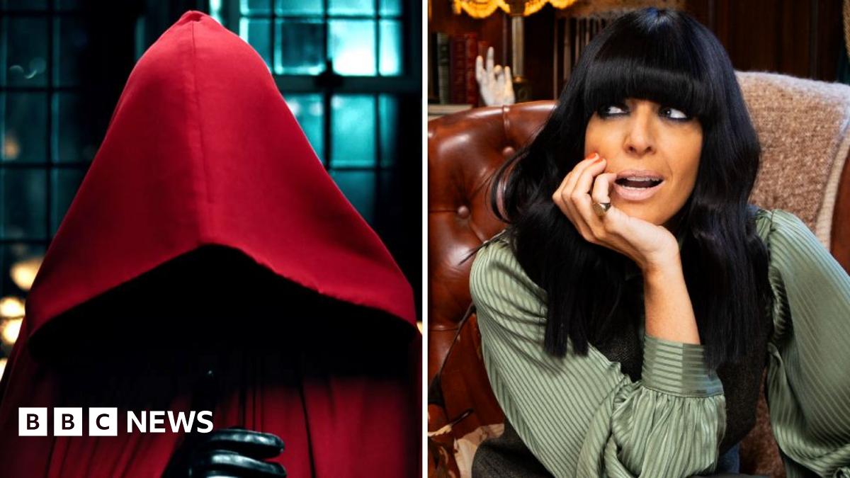 Claudia Winkleman sitting on a chair in the Traitors castle