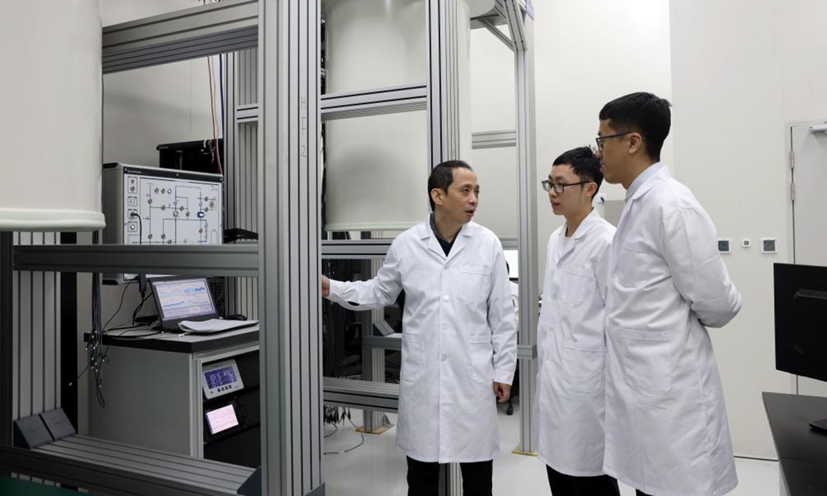 Zhu Xiaobo (first from left), professor at the University of Science and Technology of China and chief scientist of the
