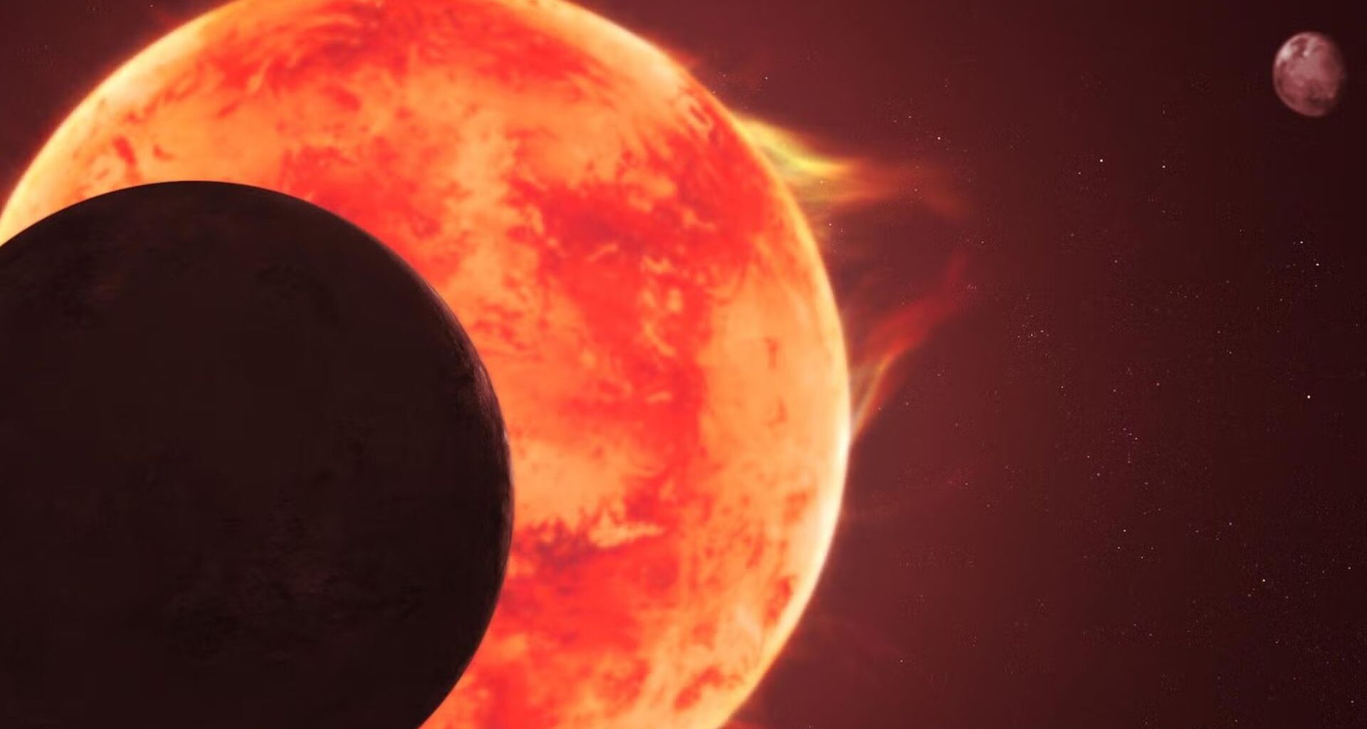 A silhouette of a planet is in front of a giant sun with a small planet to the right of the image