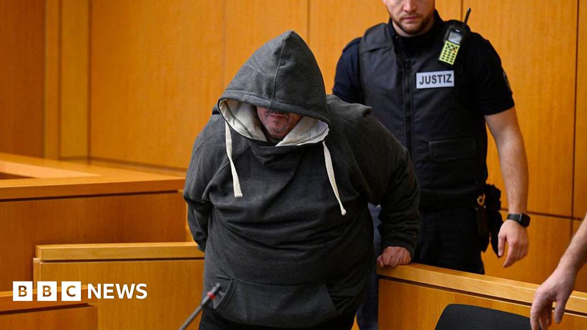 The defendant Fernando P. is escorted by a justice officer at the regional court to hear the verdict in the case where he is accused of drugging and raping his wife in Aachen, western Germany, December 19, 2025.