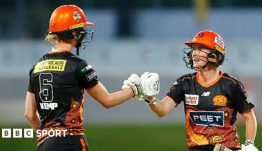 Beth Mooney and Freya Kemp punch gloves