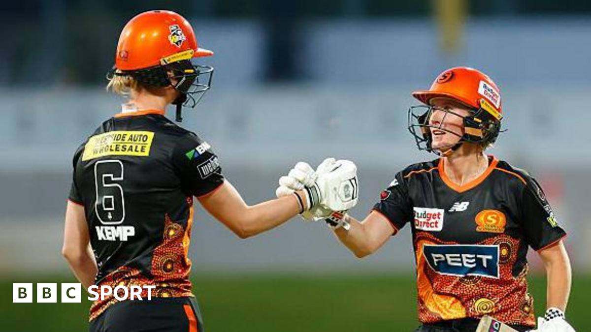 Beth Mooney and Freya Kemp punch gloves