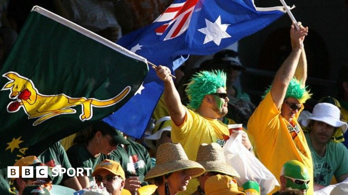 Australia fans wave flags at the Gabba in 2006