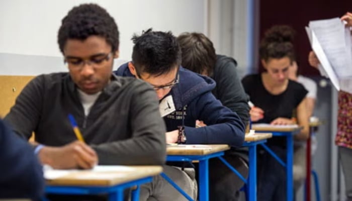 Representational image of students taking an exam. — AFP