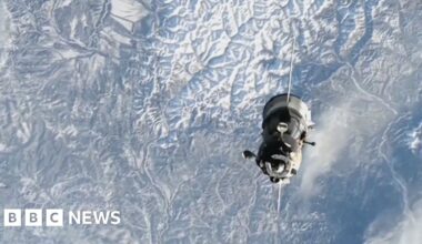 Spacecraft with three astronauts inside is seen returning to Earth.