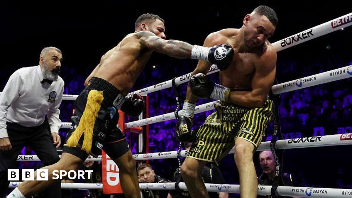 Troy Williamson punches Callum Simpson