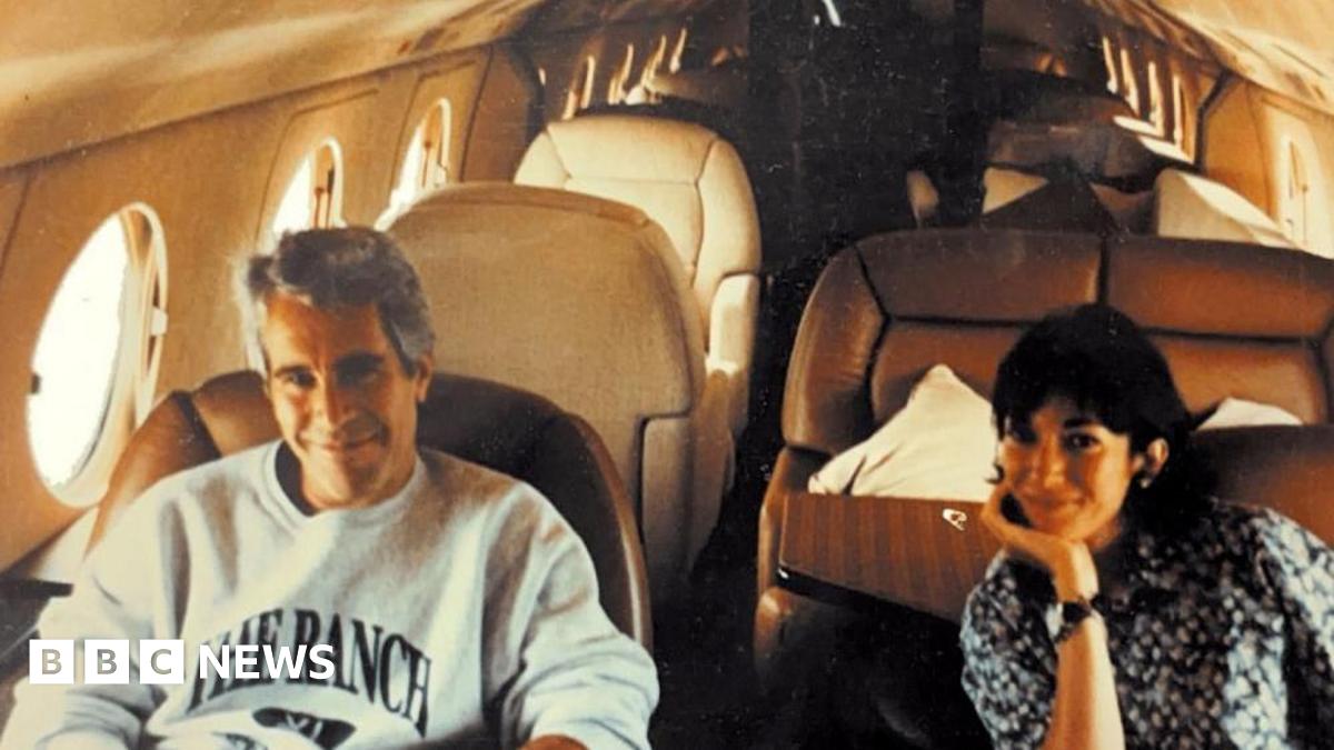 Jeffrey Epstein is smiling and seated in a plane with former girlfriend Ghislaine Maxwell