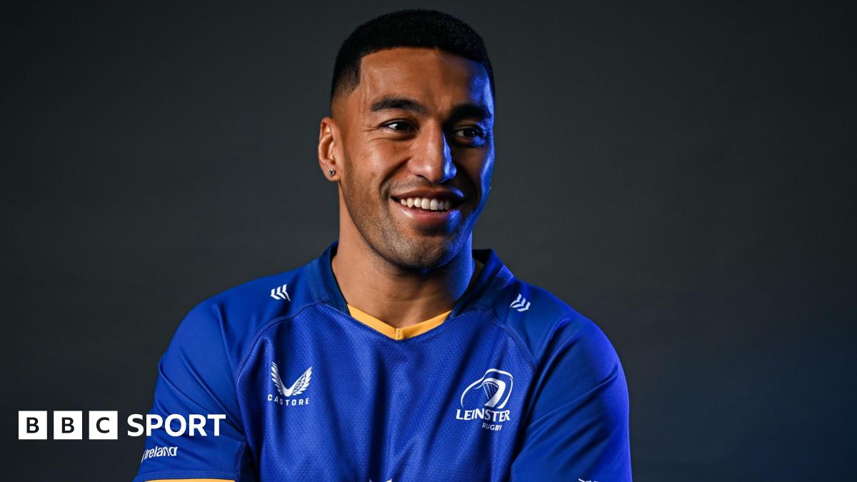 Rieko Ioane poses in a Leinster shirt