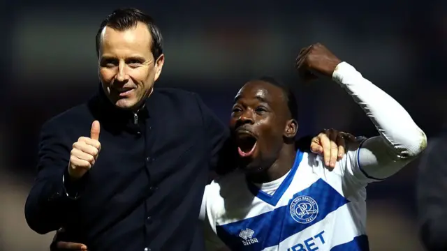 QPR boss Julien Stephan giving the thumbs-up alongside goalscorer Amadou Mbengue