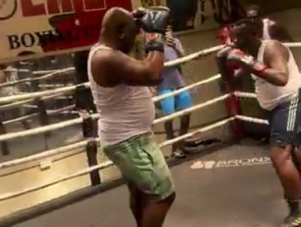 Bukom Banku and Akrobeto engage in playful boxing antics