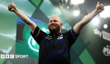 Justin Hood celebrates