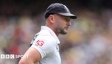 Gus Atkinson looks on