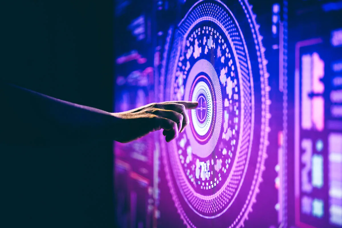 Abstract hand pointing at a glowing digital interface with concentric data circles in neon purple and blue colours.